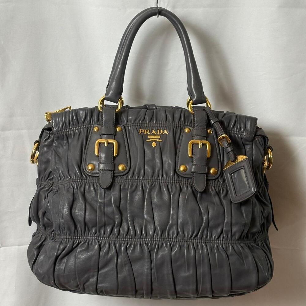 Prada Nappa Gaufre Top Handle Bag featuring signature ruched leather